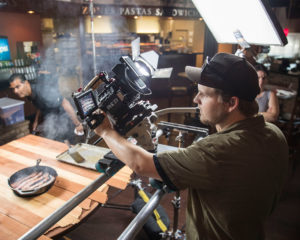 Kyle films sizzling bacon