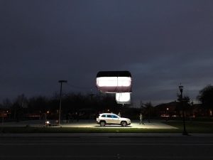 SUV under light
