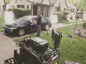 Filming a blue car