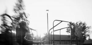 Child playing at sunset