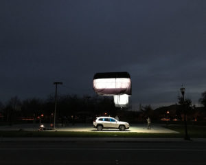 SUV under light