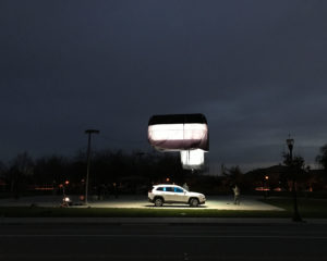 SUV under light