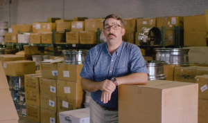 Spokesperson in warehouse