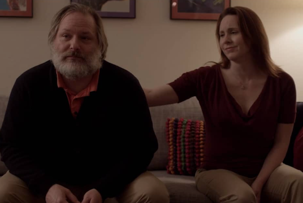 Couple sitting on couch