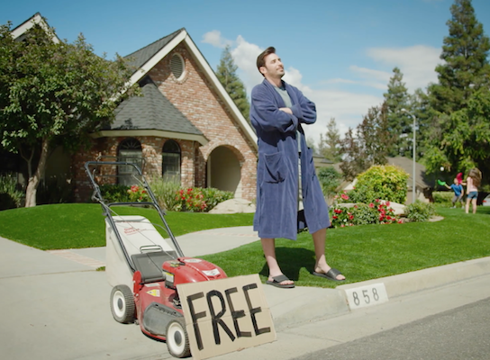 Man giving away lawn mower
