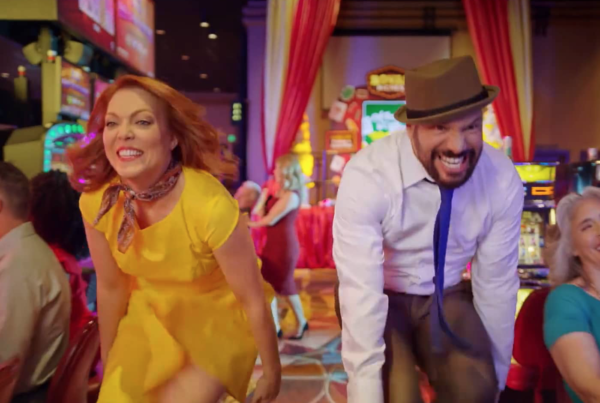 A man and a woman dancing in a casino