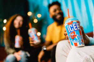A man and a woman drinking ICEEs