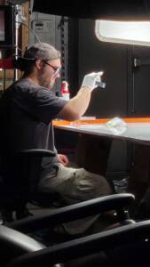 Max working on production set