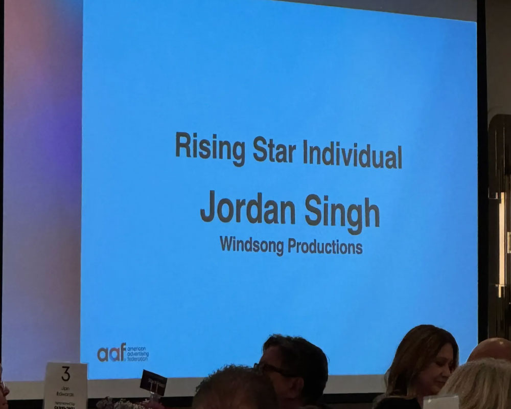 Projected screen at the 2025 AAF Fresno Honors announcing Jordan Singh of Windsong Productions as the Rising Star Award recipient.